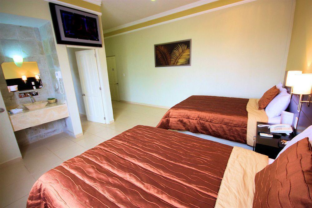 Gamma Leon Hotel Bagian luar foto